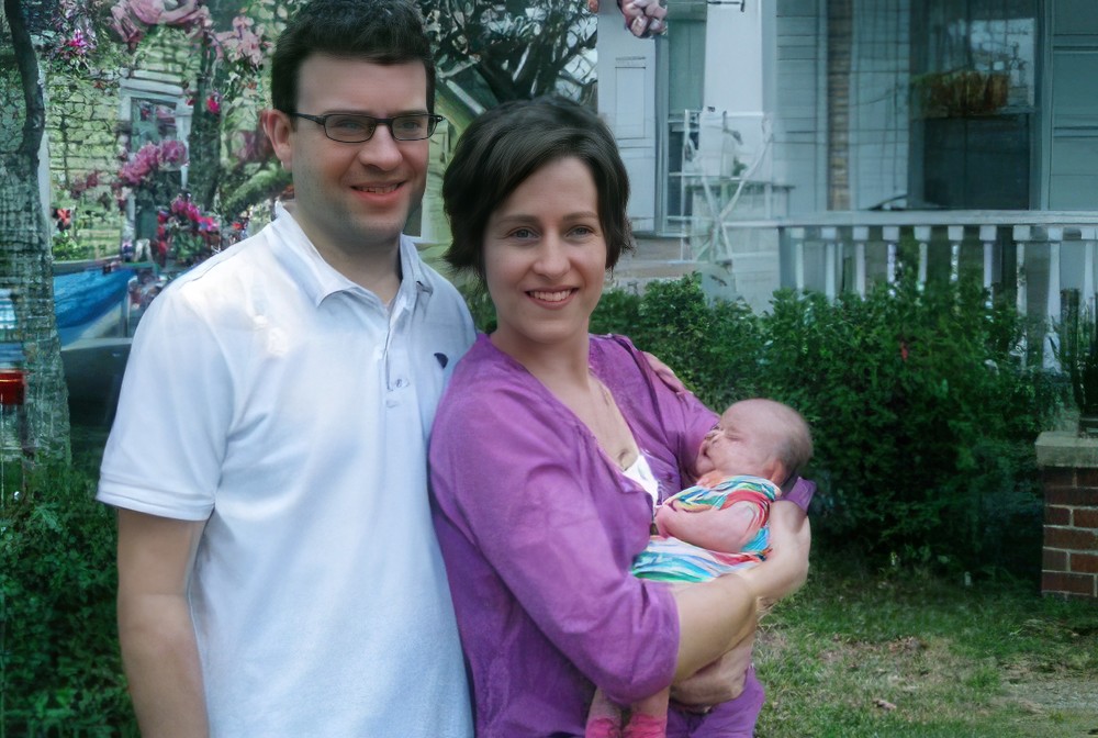 Evan and Jennifer with their baby