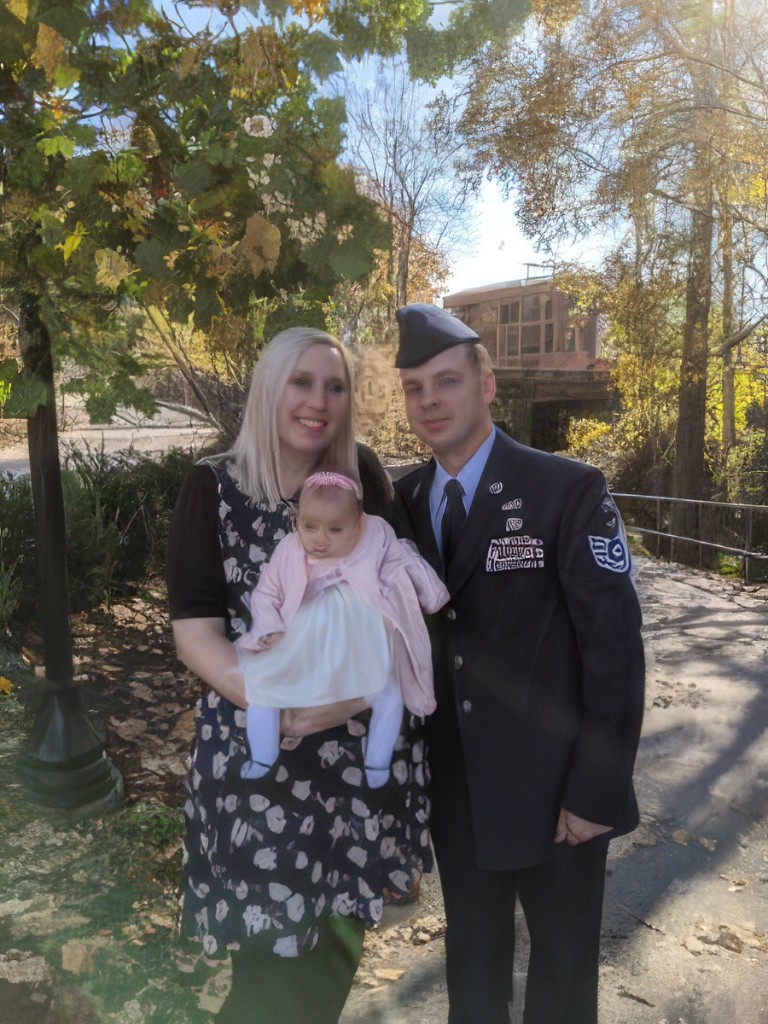 Harris and Kara with their baby daughter