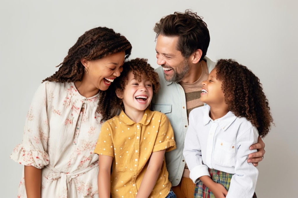 Smiling family of four
